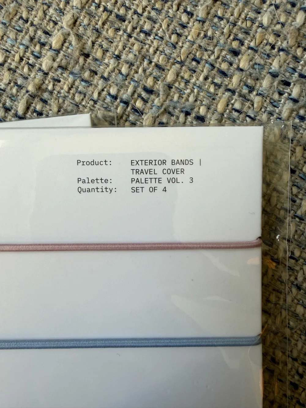 Cloth and Paper Exterior Bands for Travel Cover